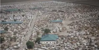  ?? JANE HAHN/FOR THE WASHINGTON POST ?? A camp for internally displaced people in Ngala, Nigeria. There are more than 140,000 people in the camp, most of whom have arrived since the town was freed from rebel control in September 2016.