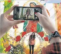  ??  ?? JESSICA ALVAREZ photograph­s Briana Alvarez recently at Mariachi Plaza. In Boyle Heights, talk of President Trump is everywhere, most of it critical and tinged with uncertaint­y.