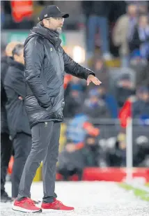  ?? Photo / Getty Images ?? The fact Liverpool ground staff cleared ice from only half the pitch against Leicester does not reflect well on Jurgen Klopp.