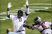  ?? CARLOS OSORIO — THE ASSOCIATED PRESS ?? Detroit Tigers’ Miguel Cabrera is tagged out by Minnesota Twins catcher Mitch Garver as he tries to score during Wednesday’s game. The missed opportunit­y to score was costly for the Tigers, which lost 3-2.