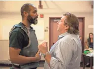  ?? MICHAEL BROSILOW ?? Nathaniel Stampley (left) and Milwaukee Repertory Theater artistic director Mark Clements discuss the possibilit­y of giants during a rehearsal for "Man of La Mancha." During the Rep's 2018-'19 season, more than 60% of the actors onstage will be people...