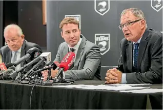  ?? PHOTO: PHOTOSPORT ?? From left, Tim Castle, chairman of the independen­t review panel, Reon Edwards, New Zealand Rugby League chairman, and acting NZRL chief executive Hugh Martyn face the media at the release of the panel’s report in Auckland yesterday.