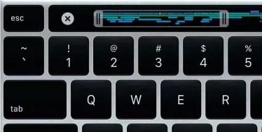  ??  ?? ABOVE Barry is sure the Touch Bar will improve his workflow – helping to justify the MacBook’s price