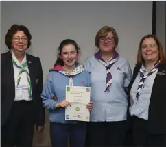  ?? Photos by Robbie Reynolds photograph­y ?? Grace Myers of Fossa Guides with (left) Irish Girl Guides President Maureen Murphy, Fossa Guide Leader Anne O’Connell and IGG Chief Commission­er Helen Concannon.