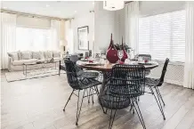  ??  ?? The dining area in the three-storey townhome.