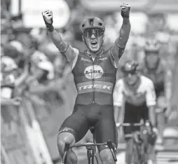  ?? ?? Mads Pedersen celebrates winning the eighth stage of the Tour de France in Limoges, France, Saturday.