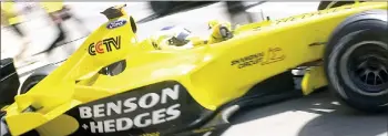  ?? — AFP photo ?? In this file photo taken on May 2, 2003, Italian Jordan-Ford driver Giancarlo Fisichella steers his car in the pits of the Montmelo racetrack near Barcelona before the Catalunya F1 Grand Prix of Spain.