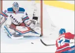  ?? GRAHAM HUGHES/AP ?? The Canadiens’ Artturi Lehkonen takes a shot against the Rangers’ Alexandar Georgiev during the second period Saturday in Montreal.