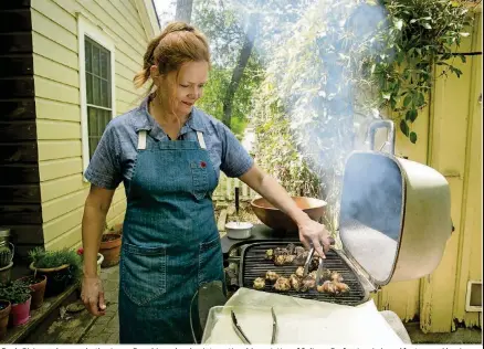  ?? JAY JANNER / AMERICAN-STATESMAN ?? Paula Disbrowe has won both a James Beard Award and an Internatio­nal Associatio­n of Culinary Profession­als Award for two cookbooks she wrote with Donald Link. Her newest book is called “Food52 Any Night Grilling: 60 Ways to Fire Up Dinner.”