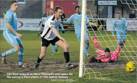  ?? Picture: Chris Davey FM5047952 ?? Carl Rook looks on as Harry Stannard’s shot opens the the scoring in Faversham’s 2-1 win against Molesey
