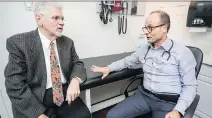  ?? JOHN MAHONEY ?? Dr. Antonio Vigano, right, with a patient at Santé Cannabis clinic. A trial could lead to medicinal marijuana being sold in pharmacies.