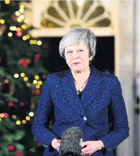  ??  ?? Prime Minister Theresa May makes a statement outside 10 Downing Street last night after she survived an attempt by Tory MPs to oust her with a vote of no confidence Victoria Jones/PA Wire