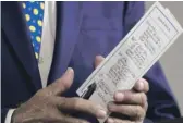  ?? ANDREW HARNIK/AP ?? The notes of former Vice President Joe Biden on Tuesday reference Sen. Kamala Harris, D-Calif., among other subjects.