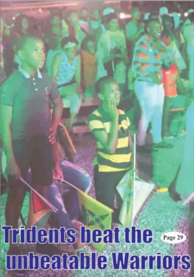  ?? (Photo by Terrence Thompson) ?? Their faces tell the story: Young Guyana Amazon Warriors (GAW) supporters react to the team’s loss in the finals of the Caribbean Premier League (CPL) at the government-sponsored Watch Party, held at the D’Urban Park last night.