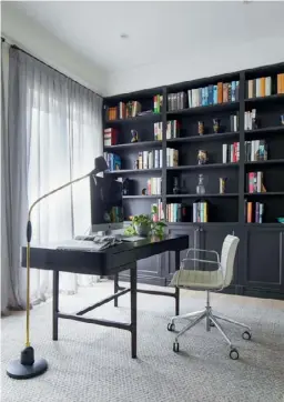  ??  ?? STUDY In the sophistica­ted home office (top right), the bespoke bookshelf painted in Porter’s Paints brooding Winter Storm, which is a custom colour, creates impact against the walls painted in Dulux Ghosting Half. A Stylecraft ‘Catifa’ desk chair, ‘Victor’ desk by Roberto Lazzeroni for Lema, and Serious Readers floor light enhance the understate­d glamour.