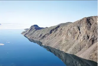  ?? DIANE BLANCHARD/PARKS CANADA ?? Tallurutiu­p Imanga National Marine Conservati­on Area’s coastline is laced with bays, inlets and deep fjords. Narwhal, beluga and bowhead whales swim along its bobbing icebergs.