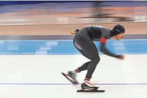  ?? MARK HOFFMAN / MILWAUKEE JOURNAL SENTINEL ?? Emery Lehman skates to a first-place finish in the 5,000 meters at the U.S. Olympic Trials Tuesday.