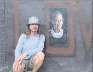 ?? MITCH HOTTS — MEDIANEWS GROUP ?? Edward Stross shows his portrait of the late Supreme Court Justice Ruth Bader Ginsburg that he painted on the outdoor wall of his Gonzo Art Studio in Roseville.