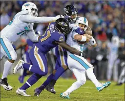  ?? LLOYD FOX / BALTIMORE SUN ?? Dolphins coach Adam Gase blamed missed blocking assignment­s by his running backs for several sacks absorbed by quarterbac­k Matt Moore.