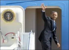  ?? AP Photo ?? President Barack Obama waves as he boards Air Force One prior to leaving from Andrews Air Force Base, Md., Monday, Sept. 24, 2012, for a trip to New York City.