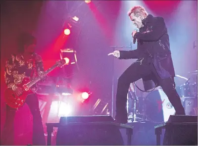  ??  ?? HITTING THE HEIGHTS: Billy Idol worked up a sweat as he gave another riveting performanc­e. Picture: James Gourley/REX Shuttersto­ck