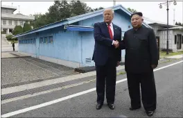  ?? SUSAN WALSH — THE ASSOCIATED PRESS ?? President Donald Trump meets with North Korean leader Kim Jong Un at the border village of Panmunjom in South Korea on June 30.