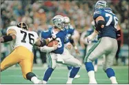  ?? AP-Gary Stewart ?? Seattle Seahawks quarterbac­k, Rick Mirer (3) is sacked for a seven-yard-loss by Kevin Henry (76) of the Pittsburgh Steelers in 1993. Lawyers for ex-players Henry and Najeh Davenport said their clients were denied awards “based on a discrimina­tory testing regime” that weighs sociologic­al factors including race. Both men would have qualified for awards had race not been considered, they said.