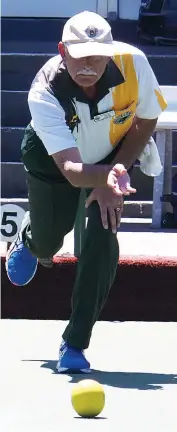  ??  ?? Warragul skip Necip Akarsu bowls his team to a 36/12 win over Traralgon in division two on Saturday.