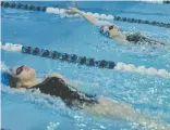  ?? [WHITNEY NEILSON / THE OBSERVER] ?? The EDSS swim team hosted their second meet on Dec. 1 with visiting schools, Kitchener Collegiate Institute and Southwood Secondary School at the Woolwich Memorial Centre. Their third and final home meet is today, Dec. 8, at the WMC. Coach Pam Germann...