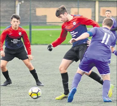  ?? Picture: Paul Amos FM 6473844 ?? Stanhope &amp; Beaver Rangers (blue and red) look to open up play against Hythe Royal British Legion in Division 1 of the Ashford Sunday League