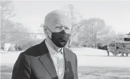  ?? PATRICK SEMANSKY/AP ?? Ahead for President Joe Biden, seen Sunday on the South Lawn of the White House, are three challenges that might dash his administra­tion on the rocks.