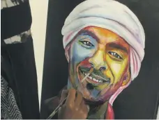  ?? Summer Baobaid ?? A portrait commemorat­ing the Emirati martyr First Lt Abdulaziz Al Kaabi is painted in Yemen