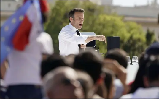  ?? Laurent Cipriani The Associated Press ?? French President and centrist candidate Emmanuel Macron speaks during a campaign rally Saturday in Marseille, France.