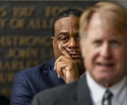  ?? Alexandra Wimley/Post-Gazette ?? Mayor Ed Gainey looks on as County Executive Rich Fitzgerald speaks about the launch of the Pittsburgh Digital Equity Coalition, Tuesday, outside of the City-County Building, Downtown.