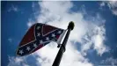  ??  ?? The Confederat­e flag: for many a symbol of racism and slavery