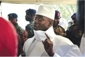  ?? — AP ?? BANJUL: In a Thursday, Dec 1, 2016 file photo, Gambia’s president Yahya Jammeh shows his inked finger before voting.