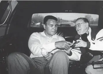  ?? 1991 PHOTO BY JOHN O’BOYLE ?? Jerry Izenberg, right, spent lots of time with Muhammad Ali in the fighter’s heyday. Ali died a year ago Saturday.