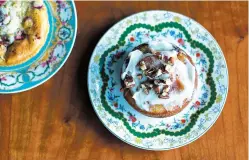  ?? PHOTO BY CORRY ARNOLD ?? Food is served on an assortment of vintage plates at St. Anselm restaurant in Washington, D.C.