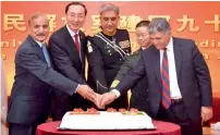  ?? APP ?? Army Chief Gen. Qamar Javed Bajwa and Chinese Ambassador to Pakistan, Sun Weidong, along with other officials cutting cake to celebrate 90th Anniversar­y of the Founding of People’s Liberation Army at China Embassy in Islamabad. —