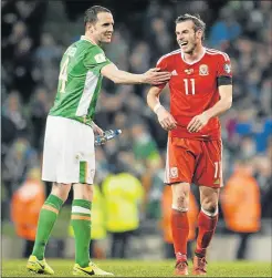  ?? Picture: GETTY IMAGES ?? LET’S STAY MATES: Gareth Bale of Wales, right, and John O'Shea of Ireland in lighter vein after the tough 2018 Fifa World Cup Qualifying goalless draw between the Republic of Ireland and Wales in Dublin on Friday