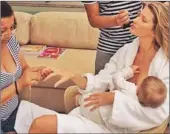  ??  ?? MULTITASKI­NG: Gisele Bündchen posted this picture on Instagram showing her feeding her daughter Vivian, 11 months, while getting her hair, makeup and nails done.