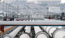  ?? — AFP ?? Picture shows export oil pipelines at an oil facility in the Khark Island, on the shore of the Gulf.