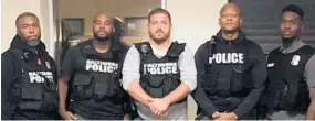  ?? BALTIMORE POLICE DEPT/HANDOUT ?? Left to right: Detective Evodio Hendrix, Detective Marcus Taylor, Sgt. Wayne Jenkins, Detective Jemell Rayam and Detective Maurice Ward are pictured in a photo for the Baltimore Police Department newsletter from October 2016.