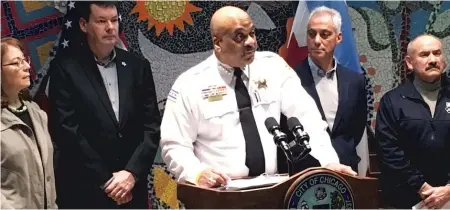  ?? | MITCH DUDEK/ SUN- TIMES ?? Police Supt. Eddie Johnson ( center) announces a task force to stop carjacking­s. Ald. Michele Smith ( 43rd, fromleft), Ald. Brian Hopkins ( 2nd), Mayor Rahm Emanuel and Ald. Ariel Reboyras ( 30th) attend a news conference Sunday.