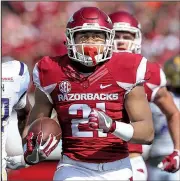  ?? Arkansas Democrat-Gazette/BENJAMIN KRAIN ?? Devwah Whaley (above) and Rawleigh Williams are one of SEC’s top returning running back tandems. “Those two guys, man, they’re very gifted,” Arkansas Coach Bret Bielema said.