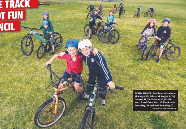  ?? Picture: GLENN FERGUSON ?? READY TO RIDE: Back from left: Mason McKnight, 10, Ashton McKnight, 6, Taj Dobson, 12, Zac Dobson, 10, Matilda Kerr, 8, and Oscar Kerr, 10. Front: Josh Beardsley, 10, and Andi Beardsley, 12.