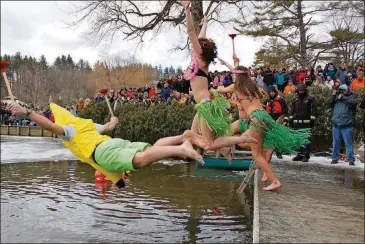  ?? WINTERFEST CONTRIBUTE­D BY BLOWING ROCK ?? The Polar Plunge in Chetola Lake is a highlight of Blowing Rock WinterFest in North Carolina.