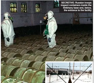  ??  ?? SECRETIVE: Russian troops inspect containers inside the Shikhany base and, below, the entrance to the facility