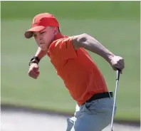  ?? Curtis Compton/Atlanta Journal-Constituti­on via AP ?? ■
■ Finn Burkholder, of The Woodlands, Texas, gives a big fist pump reacting to sinking his putt on the 18th green during the Drive, Chip, and Putt Championsh­ip at Augusta National Golf Club Sunday in Augusta, Ga.