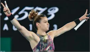  ?? (AFP) ?? Greece’s Maria Sakkari celebrates her victory against Russia’s Diana Shnaider during their women’s singles match on day three of the Australian Open in Melbourne on Wednesday.